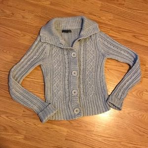 Cute gray sweater with big buttons.